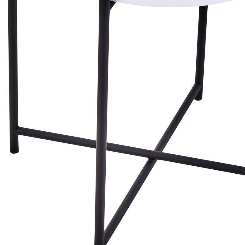 Round white tabletop supported by a sleek black metal frame with a geometric design, featuring crossed legs for stability