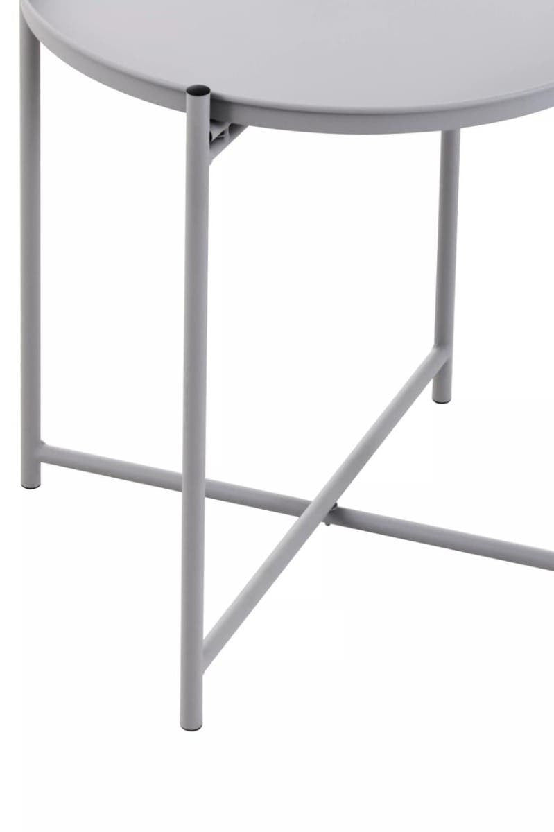 Round grey tabletop supported by a sleek, minimalist iron frame with a crossbar for stability. The design features clean lines and a modern aesthetic, suitable for various home decor styles