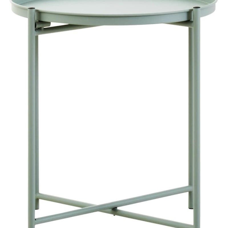 A round side table with a green iron frame and a smooth, light-colored top, featuring a minimalist design and crossed legs for stability