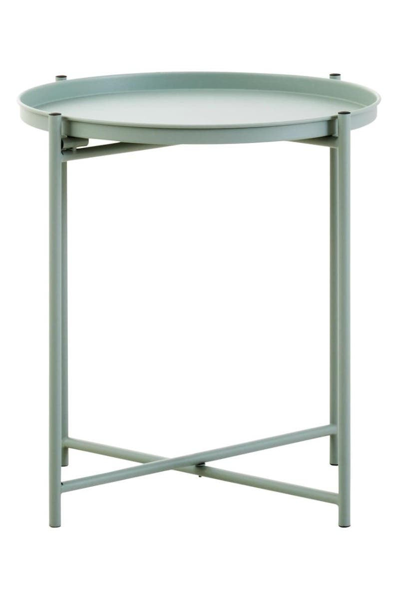 A round side table with a green iron frame and a smooth, light-colored top, featuring a minimalist design and crossed legs for stability