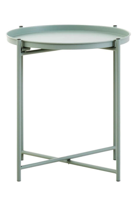 A round side table with a green iron frame and a smooth, light-colored top, featuring a minimalist design and crossed legs for stability