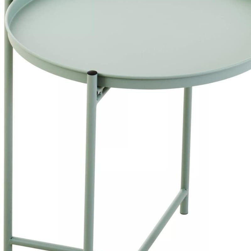 Round green iron side table with a smooth top and four slender legs, featuring a minimalist design suitable for modern home decor