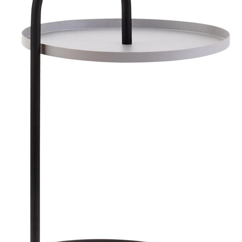 A modern side table featuring a round grey top supported by a sleek black metal frame with a circular base and an arched handle design