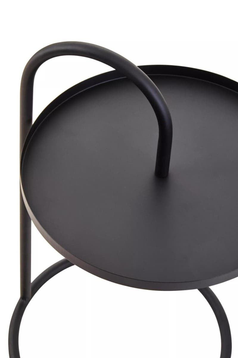 Round black top side table with a minimalist design, featuring a curved handle and a sturdy base. The surface is smooth and matte, while the legs are sleek and circular, providing a modern aesthetic suitable for various home decor styles