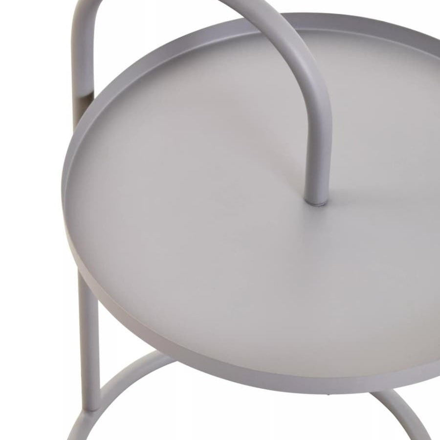 Grey hanging top side table with a round surface and a curved handle, supported by a minimalist metal frame. The design features a smooth finish and a modern aesthetic, suitable for various home decor styles