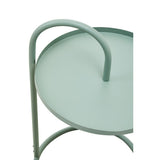 A green hanging top side table with a circular surface and a curved handle, featuring a minimalist design and a sturdy metal frame. The table has a smooth finish and is positioned at an angle, showcasing its unique shape and color