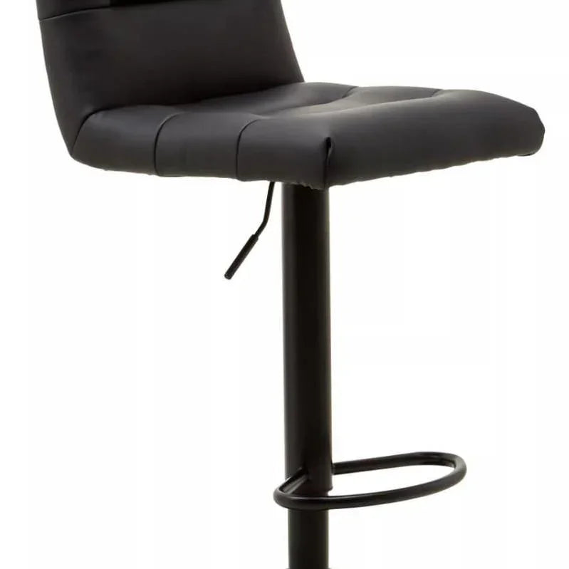Black leather bar stool with padded seat, footrest, and adjustable metal base