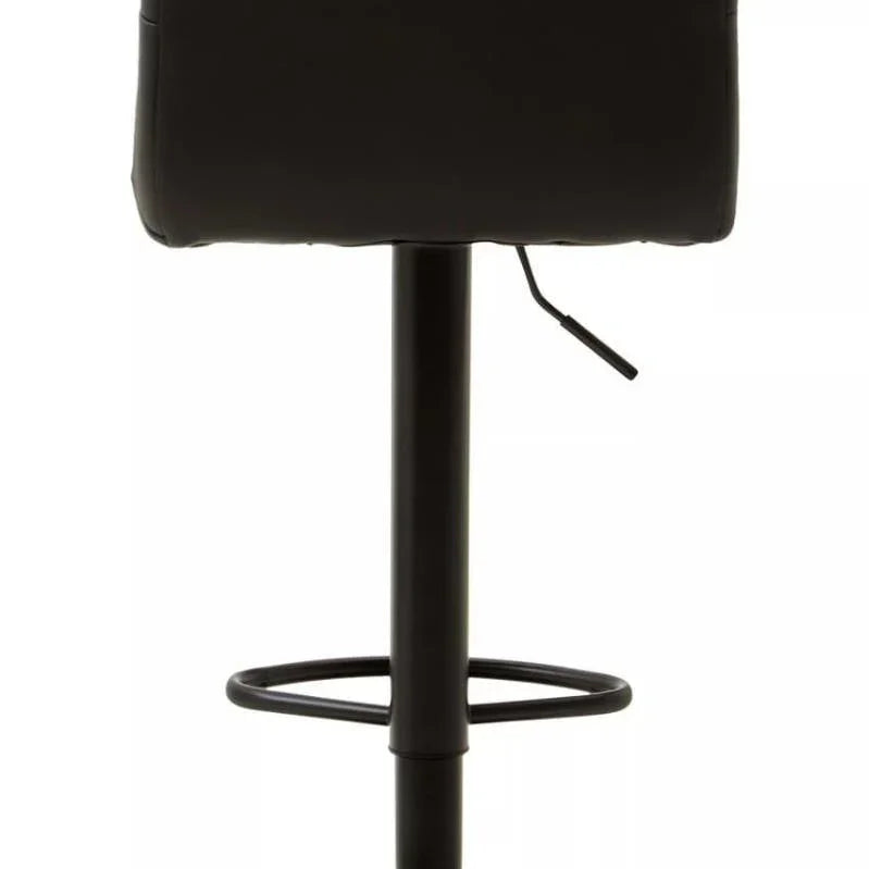 Black bar stool with padded backrest, circular footrest and metal base, rear view
