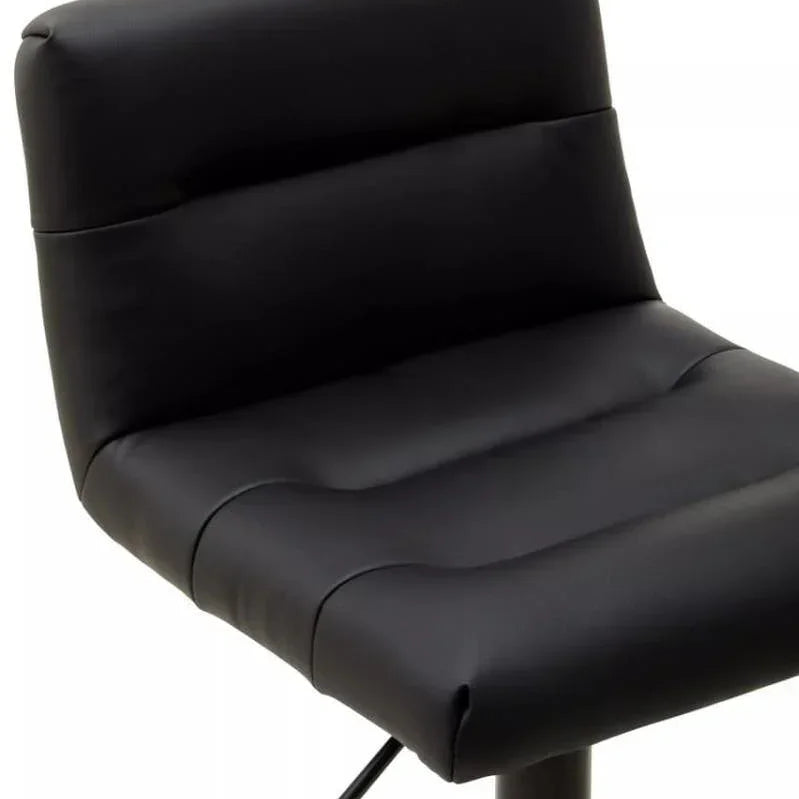 Black faux leather bar stool with padded seat and backrest, side angle view