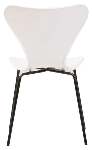 White modern dining chair with curved seat and black metal legs, rear view