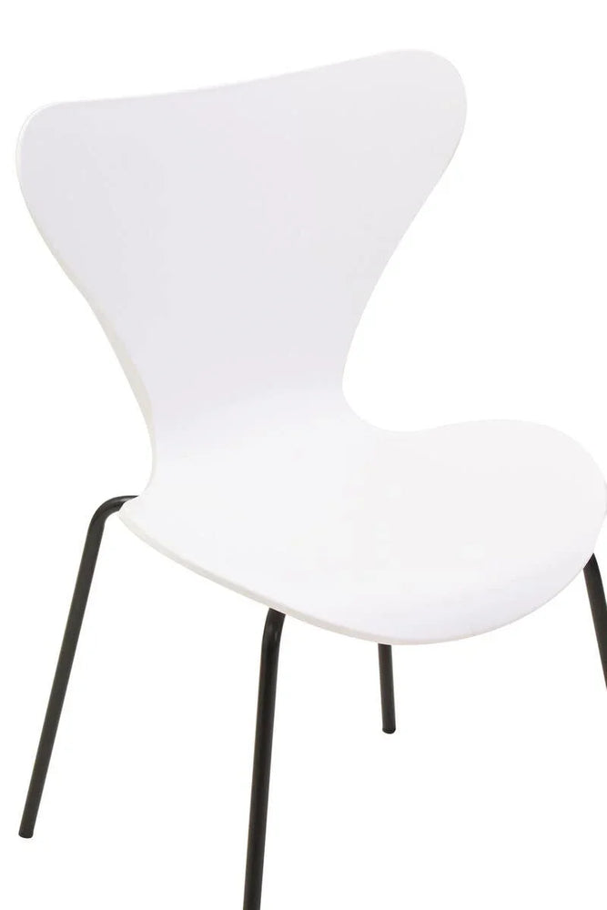White modern dining chair with molded seat and black metal legs
