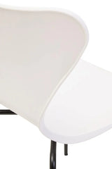 Curved white dining chair with black metal legs, close-up of backrest and seat