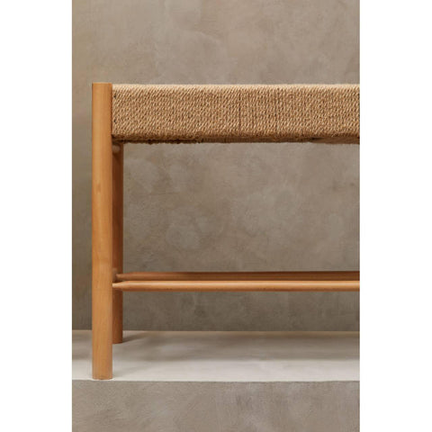 Close view of wooden bench with natural woven rope seat and light wood legs