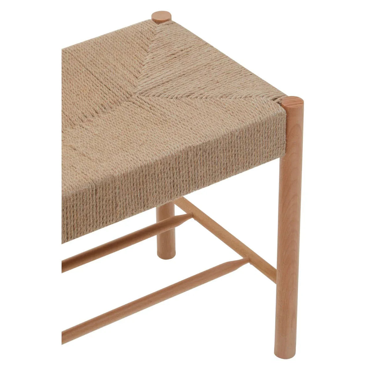 Closeup of wooden dining chair with woven natural fibre seat and tapered legs