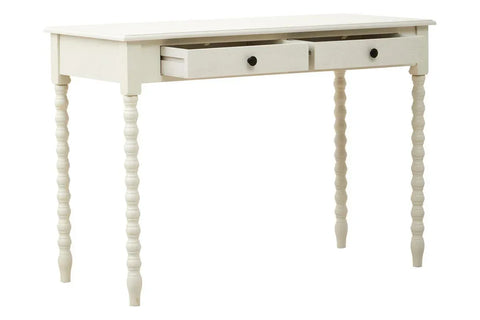 White wooden desk with turned legs and two drawers, one drawer partially open