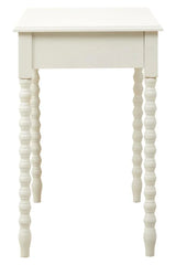 White wooden side table with carved spindle legs, front angle view