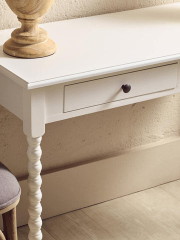 White wooden console table with single drawer and turned leg detail