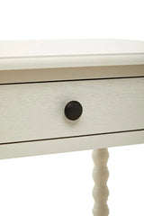 White wooden console table with black drawer knob and spindle leg detail