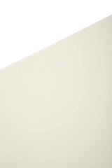 Closeup of cream dining table top with smooth finish