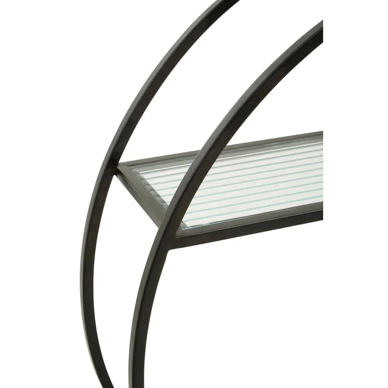 Black metal furniture frame with curved detail and striped glass shelf close-up