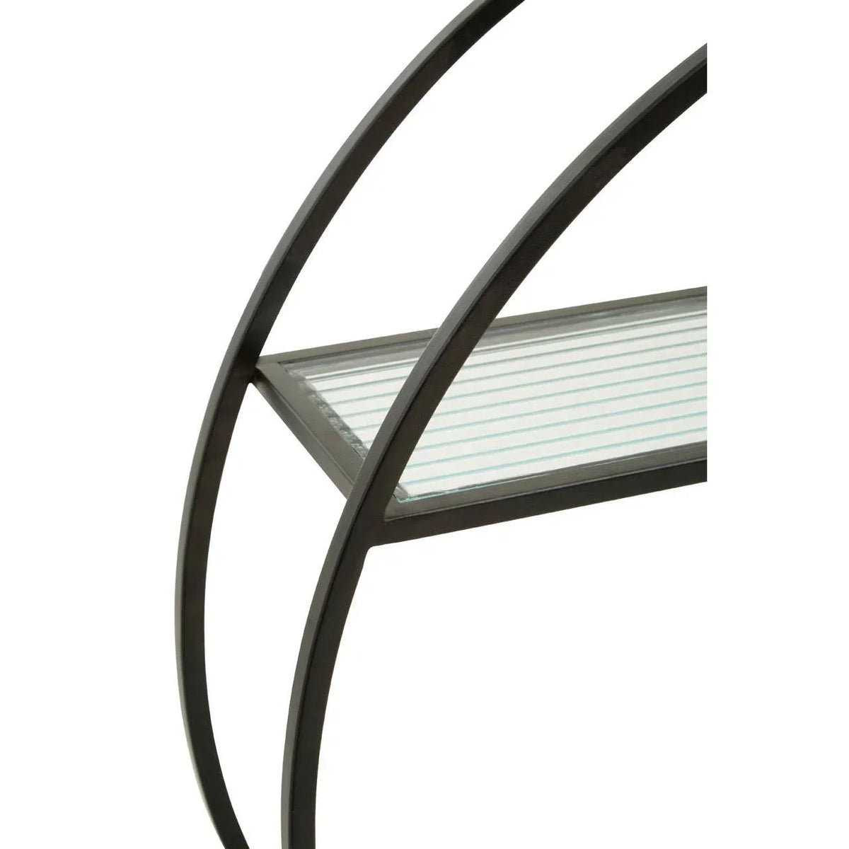 Black metal furniture frame with curved detail and striped glass shelf close-up