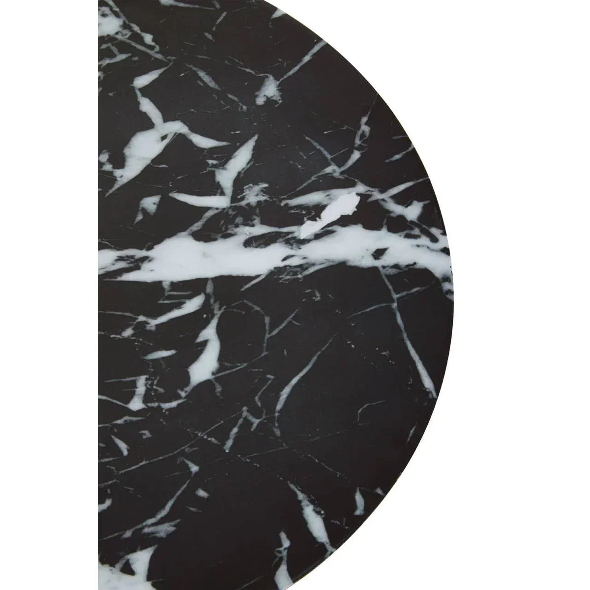 Round black marble table top with white veining close up