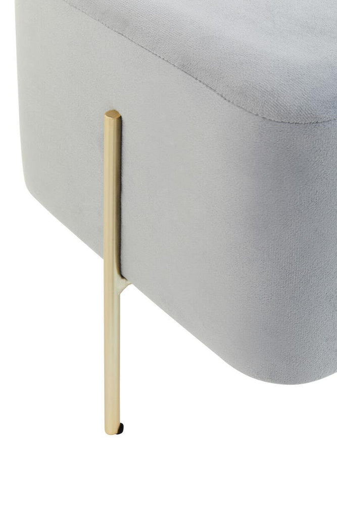 Square grey velvet stool featuring a sleek design with a single gold metal leg. The soft fabric surface is complemented by the modern metallic accent, creating a stylish and contemporary look