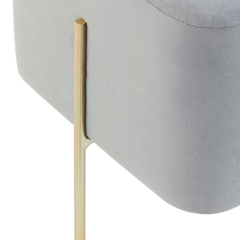 Square grey velvet stool featuring a sleek design with a single gold metal leg. The soft fabric surface is complemented by the modern metallic accent, creating a stylish and contemporary look