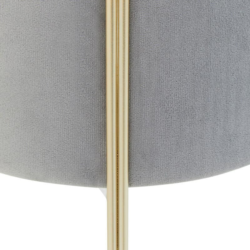 Round grey velvet stool with a smooth, plush surface and a sleek gold metal base, showcasing a modern and elegant design