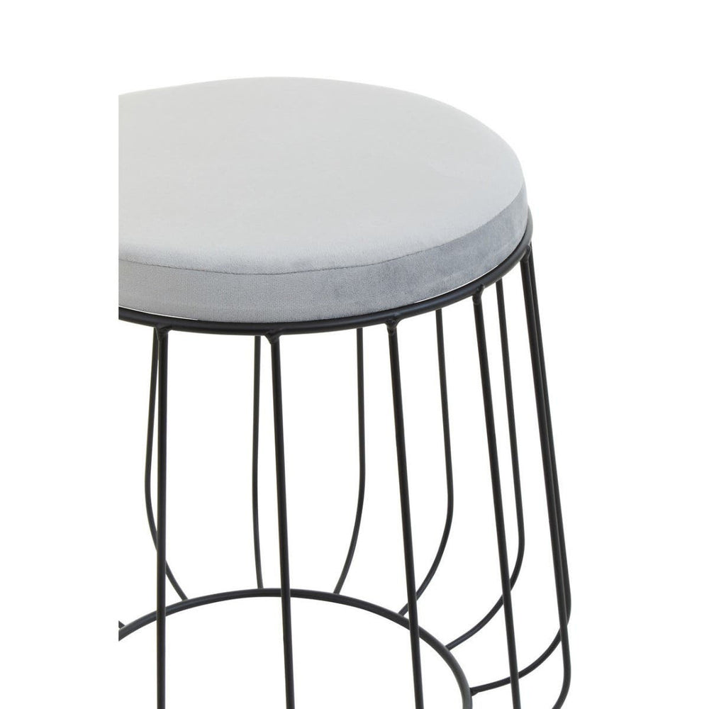 Grey velvet stool featuring a round cushioned seat and a sleek black metal frame with an open wire design