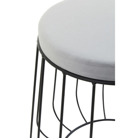 Round grey velvet stool with a sleek black metal frame, featuring a minimalist design and open wire structure. The top is plush and soft, while the base provides sturdy support