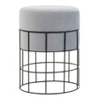 A round velvet stool with a soft gray top and a black metal cage frame, featuring a grid design that provides a modern and stylish look