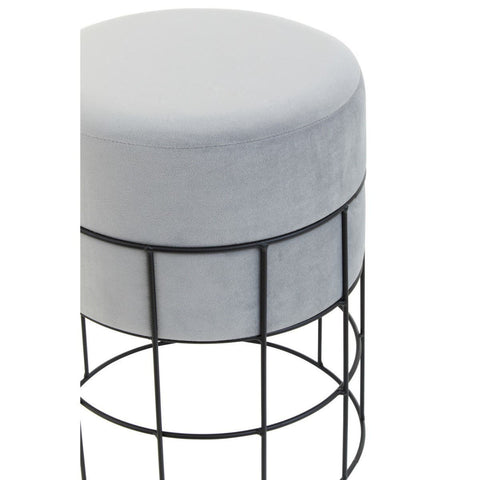 Velvet stool with a round, cushioned top in light gray, supported by a black wire cage frame. The design features a minimalist aesthetic with a sleek, modern look