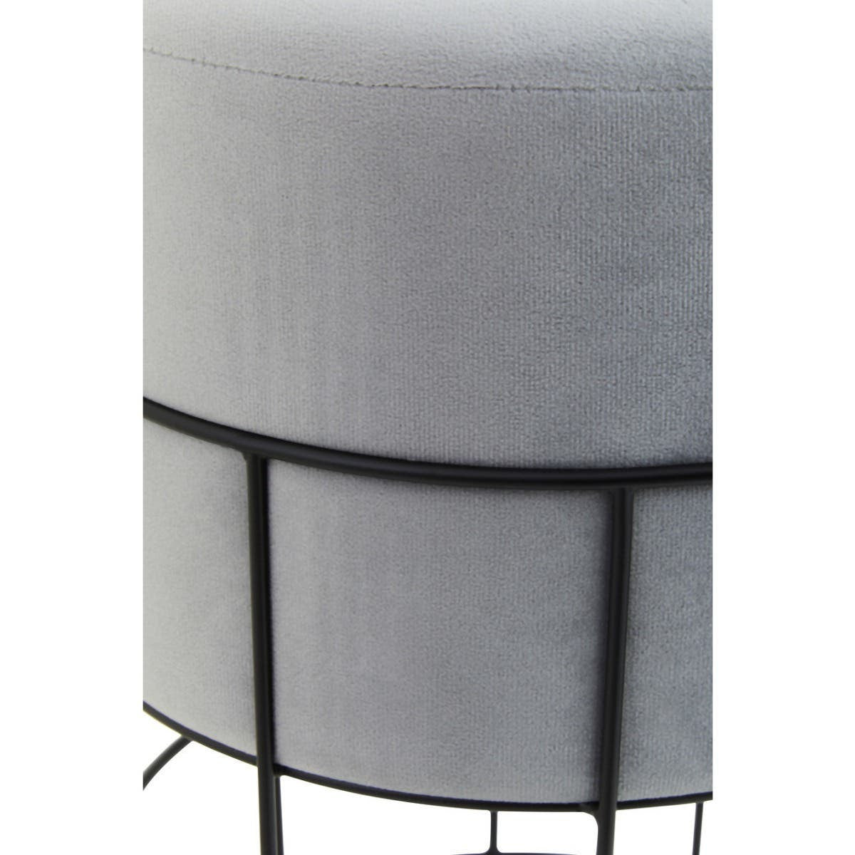 Round velvet stool in a light gray color, featuring a sleek black metal cage frame. The design showcases a smooth, plush top and a minimalist structure with four slender legs