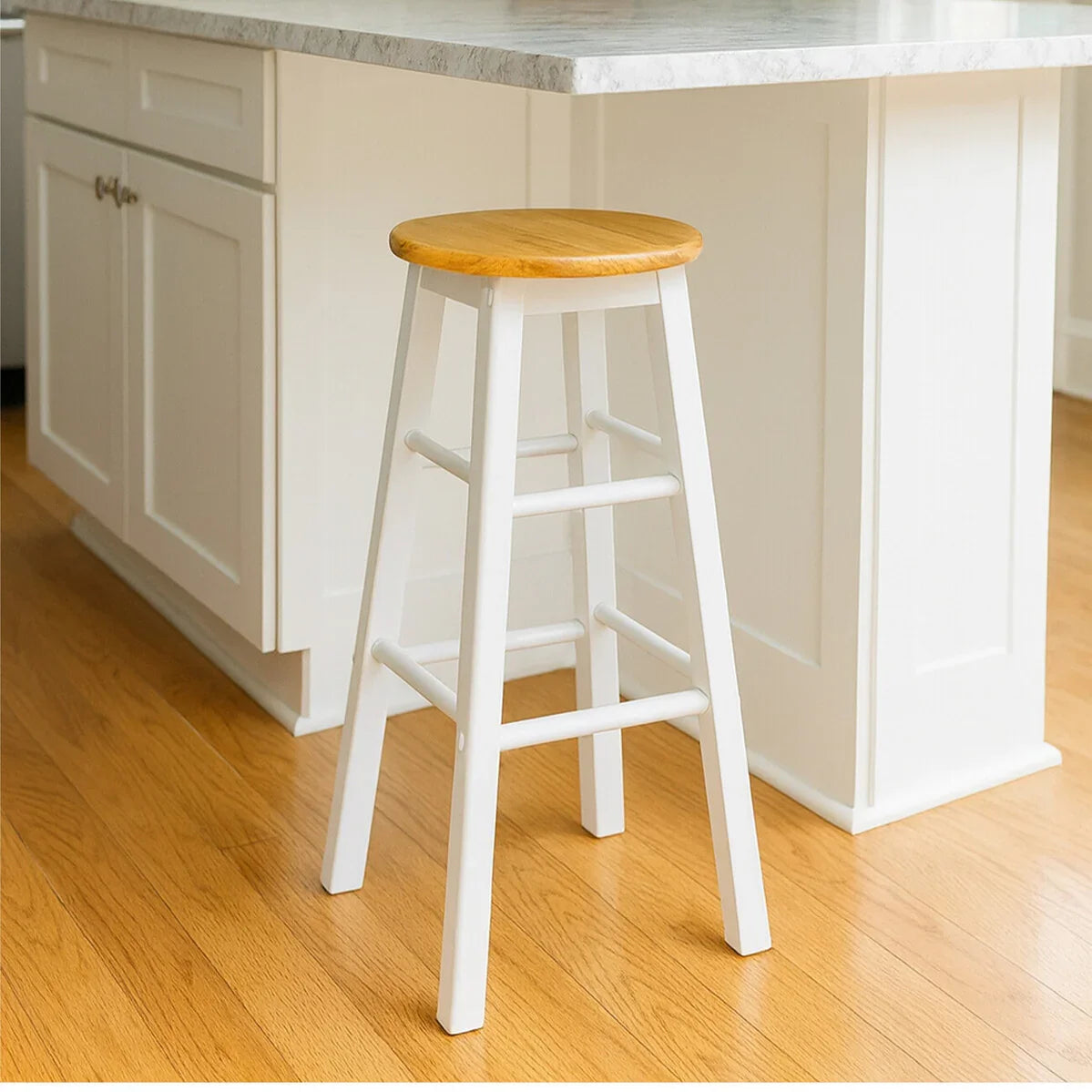 white wooden bar stool with natural wood seat beside a marble kitchen island