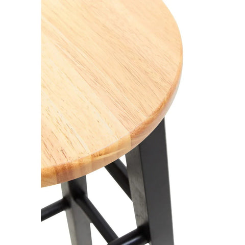Closeup of wooden bar stool seat with black legs and cross support