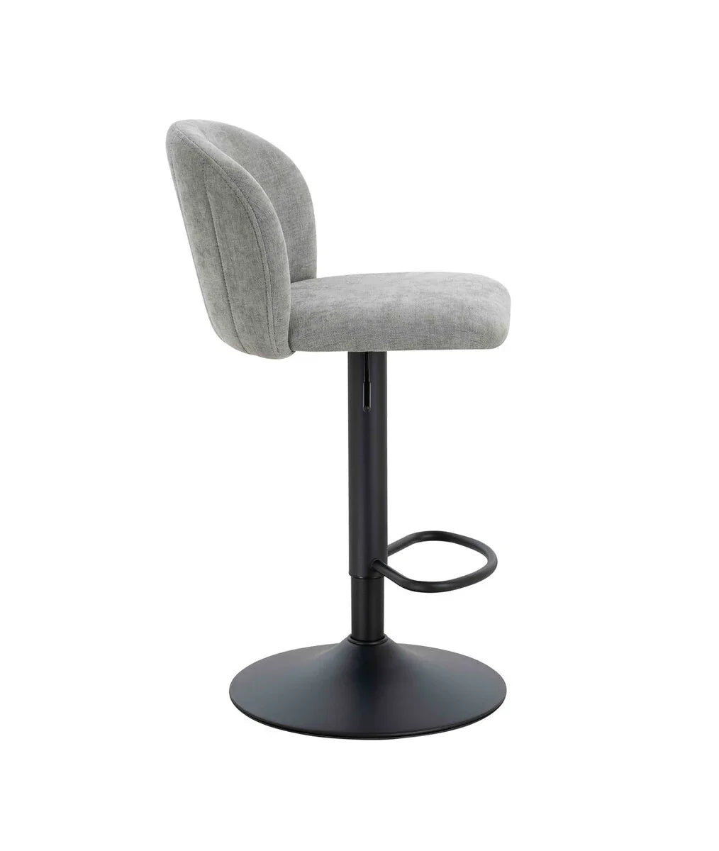 Grey fabric bar stool with curved backrest and black metal base, side profile view