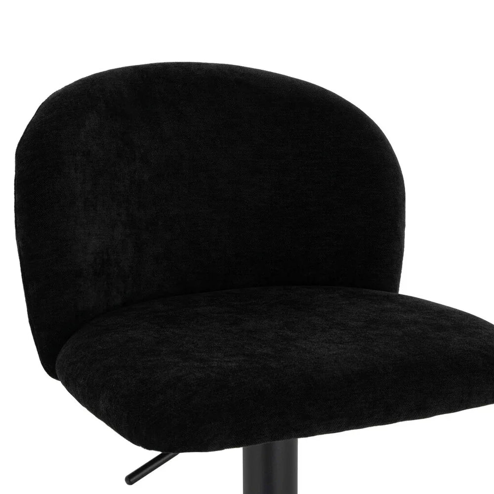 Black fabric office chair with curved backrest and padded seat, close side angle