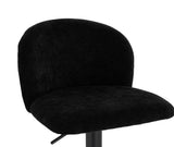 Black fabric office chair with curved backrest and padded seat, close side angle