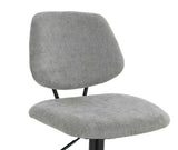 Grey fabric dining chair with cushioned seat and backrest on black metal legs