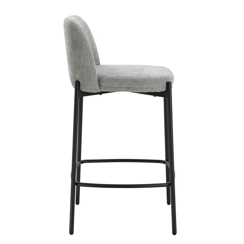 Grey fabric bar stool with black metal legs, side view