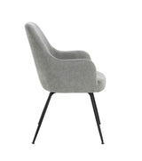 Grey fabric dining chair with curved back and black metal legs, side profile view