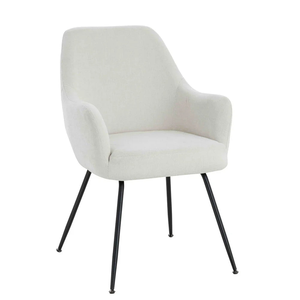 Cream fabric accent chair with curved backrest and black metal legs