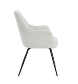 Light grey fabric armchair with black metal legs, side view