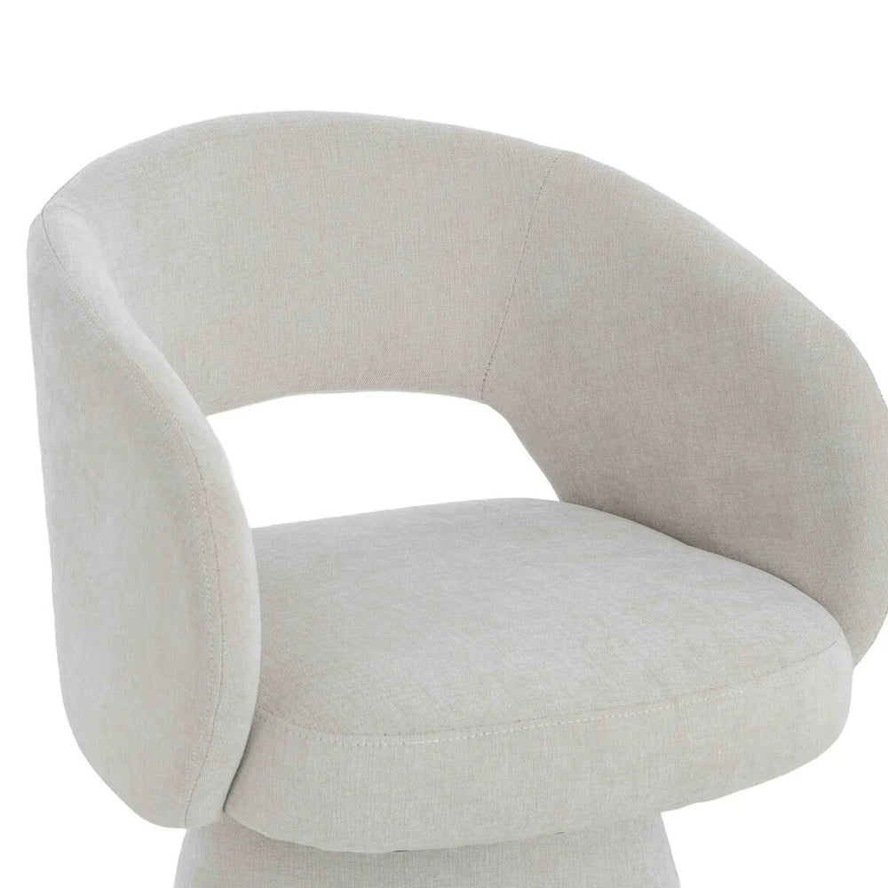 Curved back beige fabric accent chair with open back detail and cushioned seat