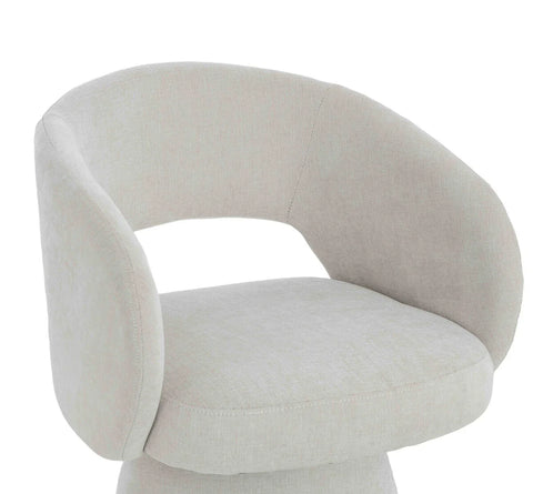 Curved back beige fabric accent chair with open back detail and cushioned seat