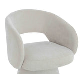 Curved back beige fabric accent chair with open back detail and cushioned seat