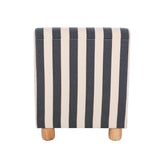 Armless chair featuring a modern black and white stripe design, complemented by light wooden feet.