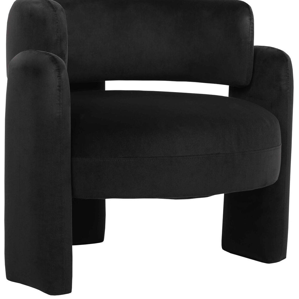 Curved black velvet chair featuring plush upholstery and rounded armrests, designed for comfort and style.