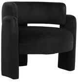 Curved black velvet chair featuring plush upholstery and rounded armrests, designed for comfort and style.